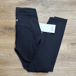 Black size 4 Lululemon new with tags power through High Rise tight/ leggings 25”